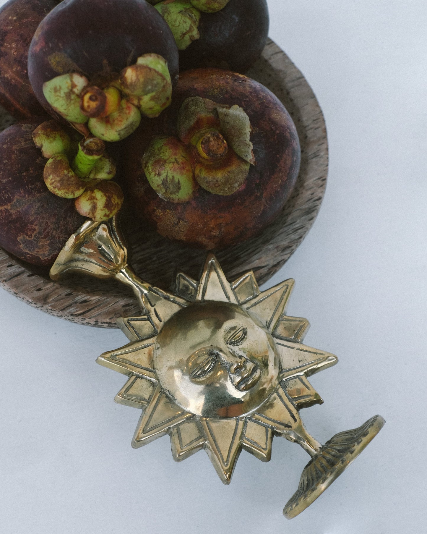 Brass sun shaped candlestick