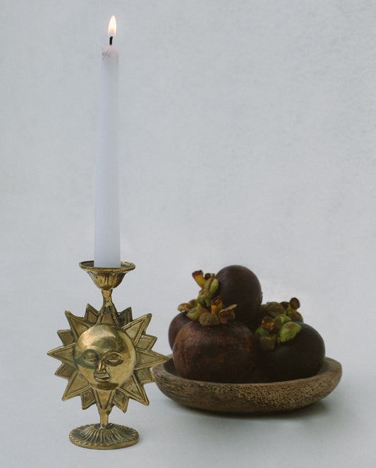 Brass sun shaped candlestick